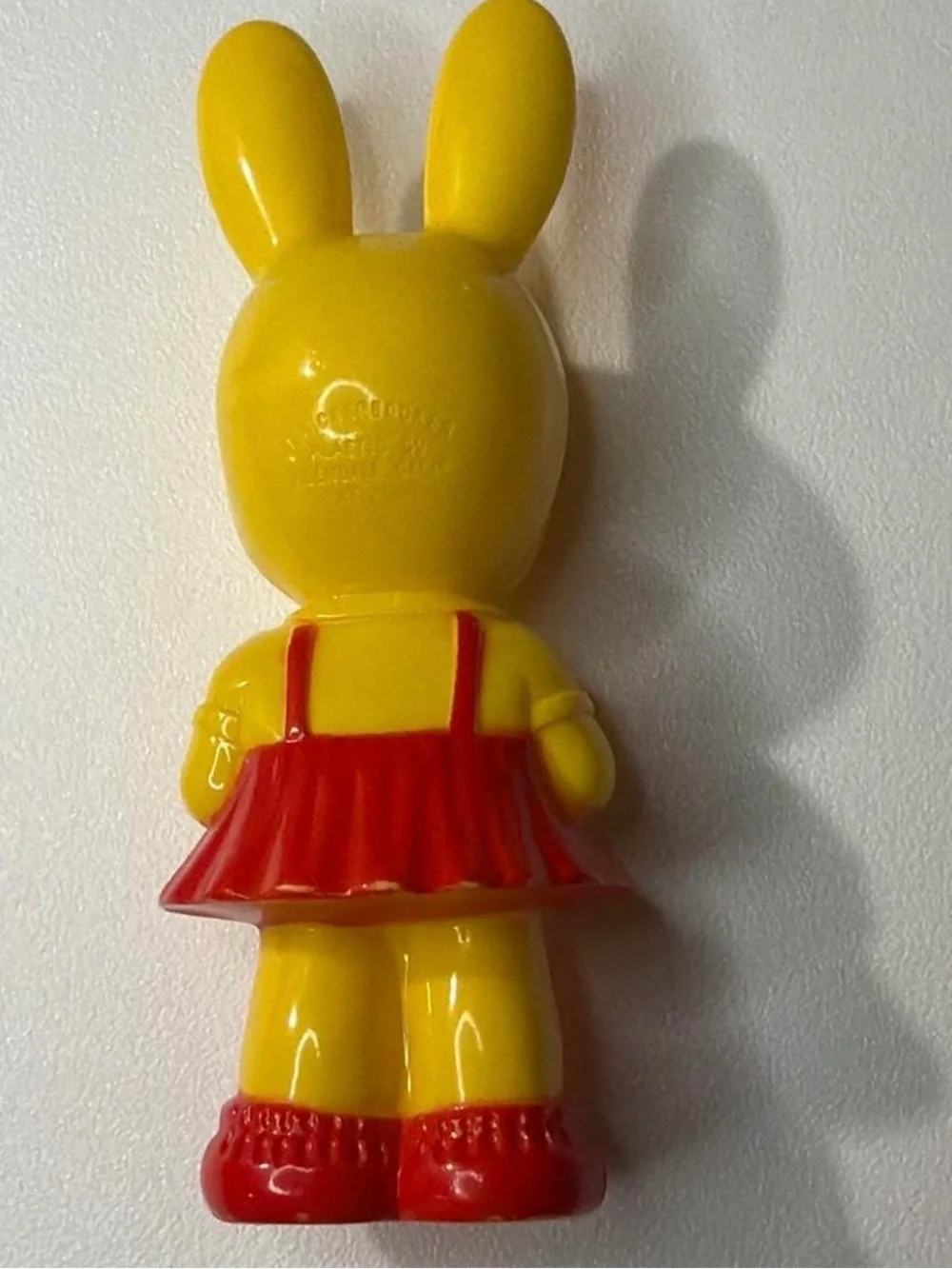 (825-3) Vintage 1950s Knickerbocker Yellow Plastic Bunny Girl Rattle Figurine